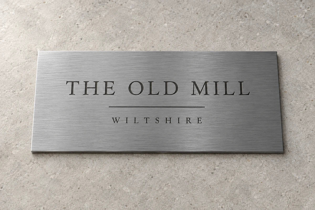 Photorealistic concept illustration of an engraved Stainless steel plaque